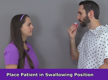 patient swallowing medication, nursing, nurse, oral liquid medication administration